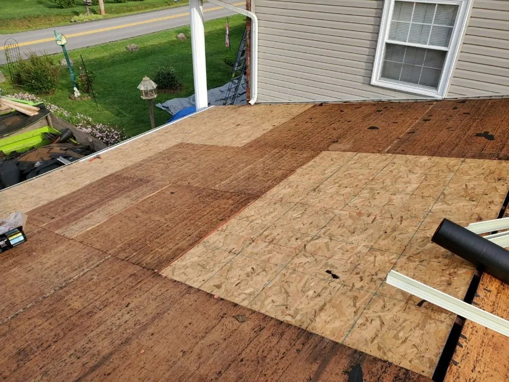 Slide of S & J Roofing