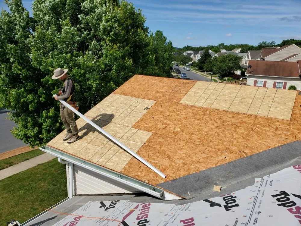 Slide of S & J Roofing