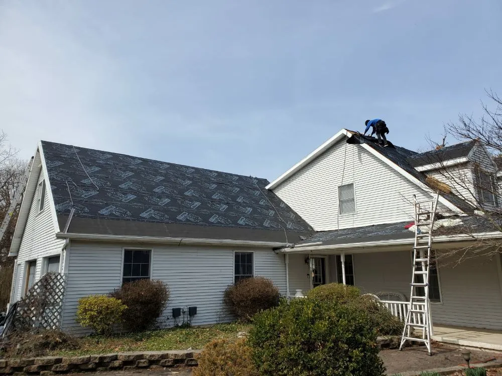 Slide of S & J Roofing