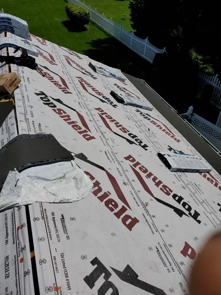 Slide of S & J Roofing