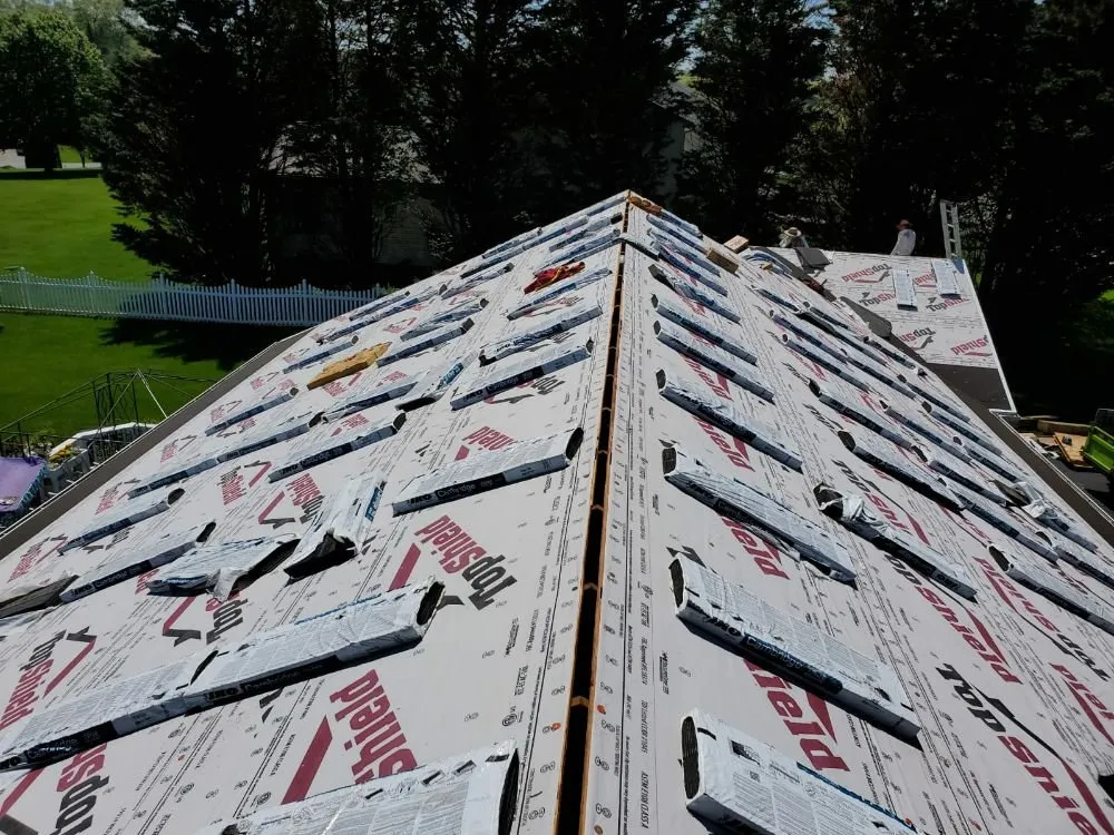 Slide of S & J Roofing