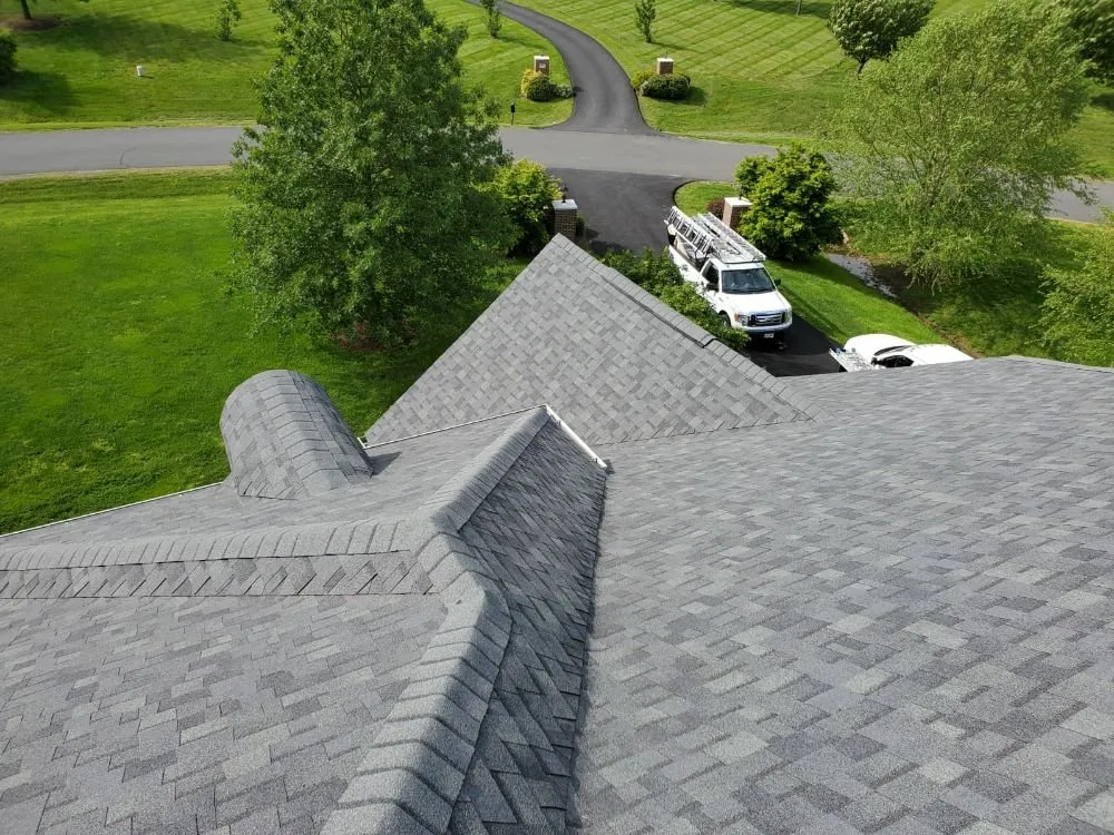 Slide of S & J Roofing