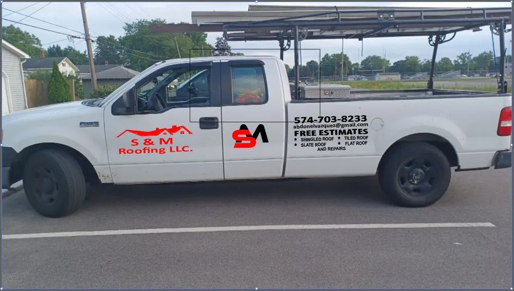 Slide of S & M Roofing