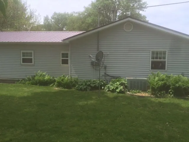 Emergency storm damage roof repair near you across Masonville, IA - S & R Construction