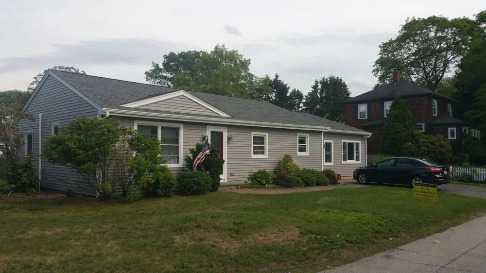 Licensed flat roof repair after storm damage in Riverside, RI by S & S Construction