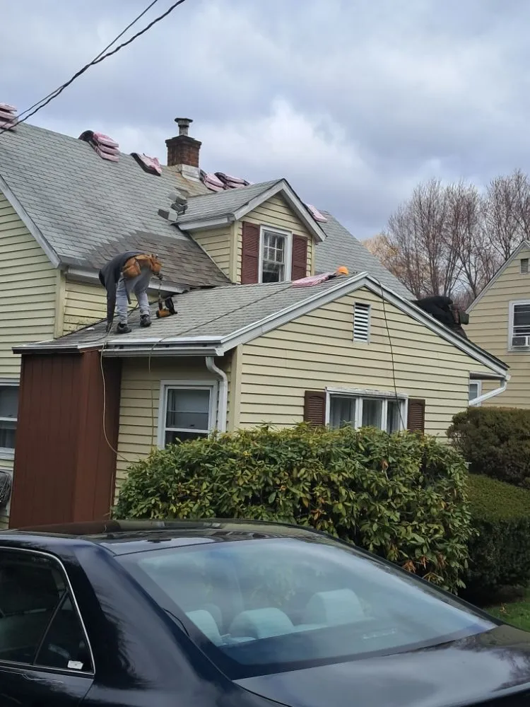 Slide of S & S Roofing