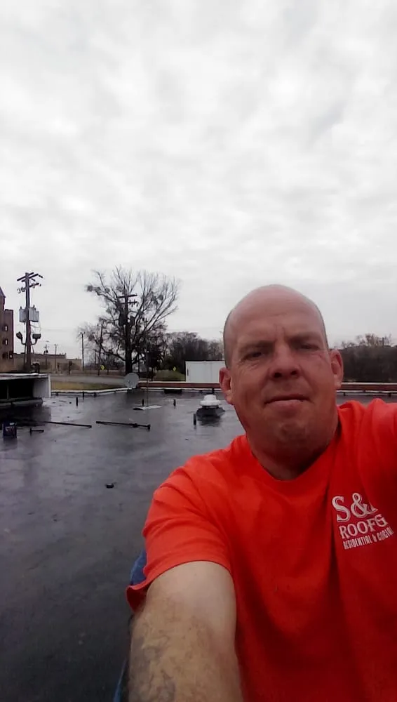 Slide of S and H Roofing