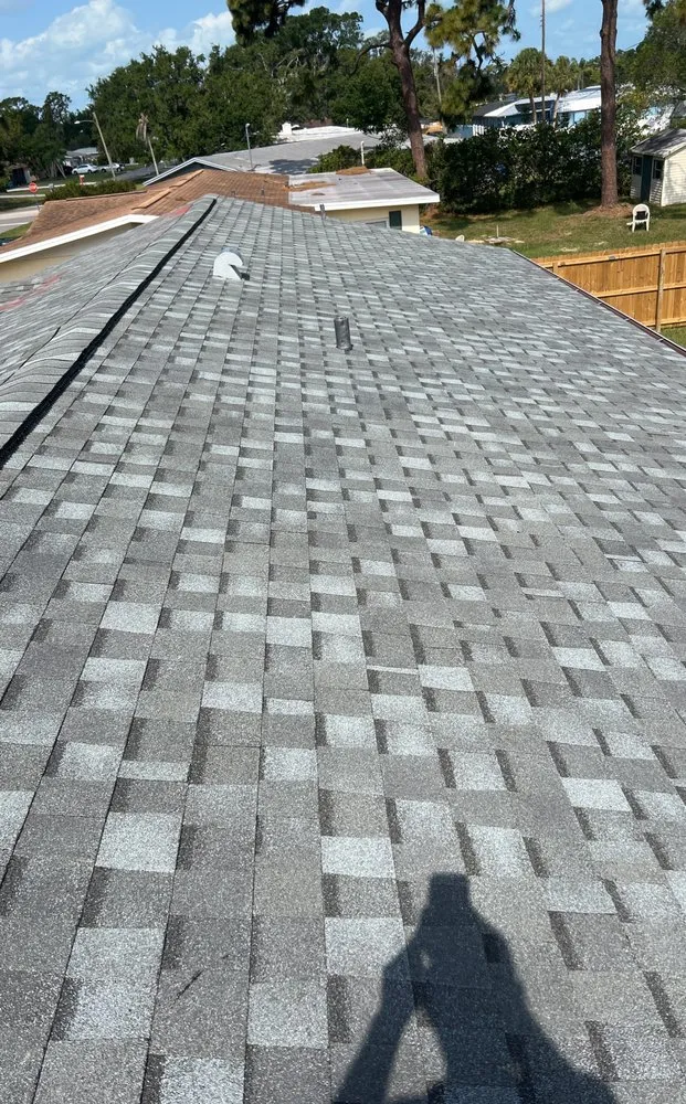 Slide of S F Roofing Quest