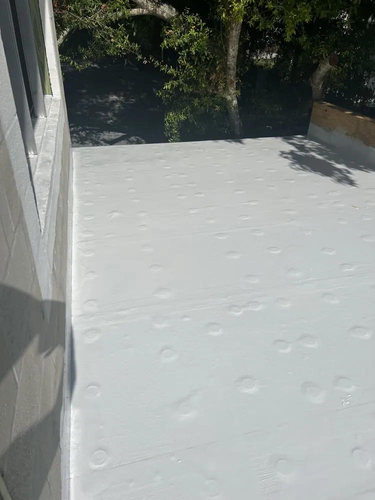 Slide of S F Roofing Quest