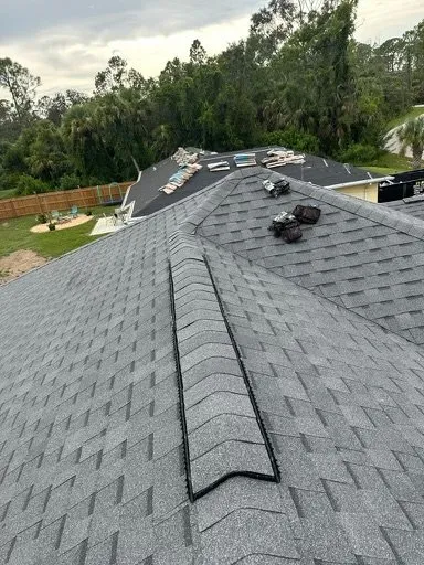 Slide of S F Roofing Quest
