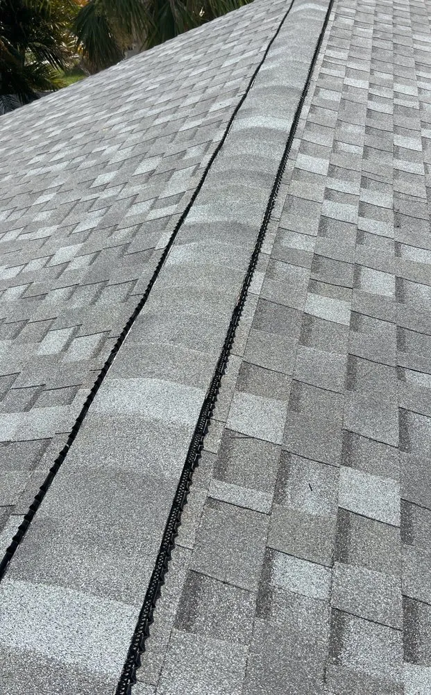 Slide of S F Roofing Quest