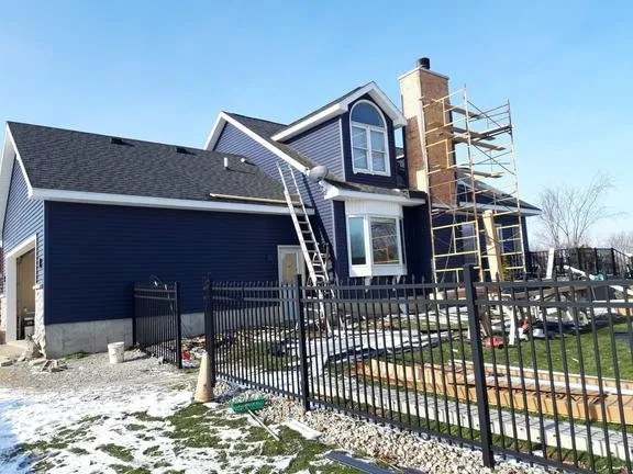 Trusted flat roof repair for residential properties across Spencerville, IN - S L Construction