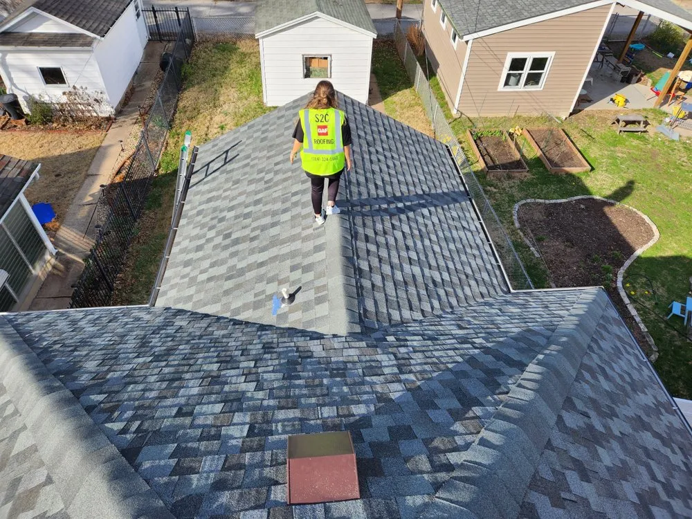 Slide of S2C Roofing