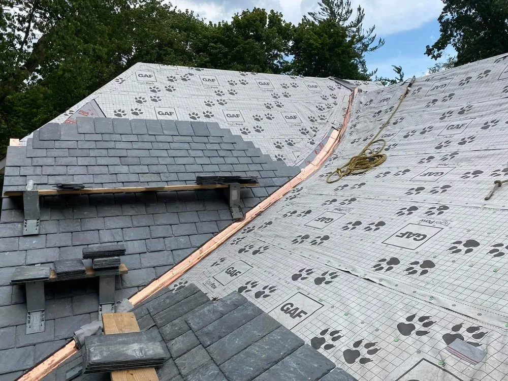 Slide of Sagan Commercial Roofing