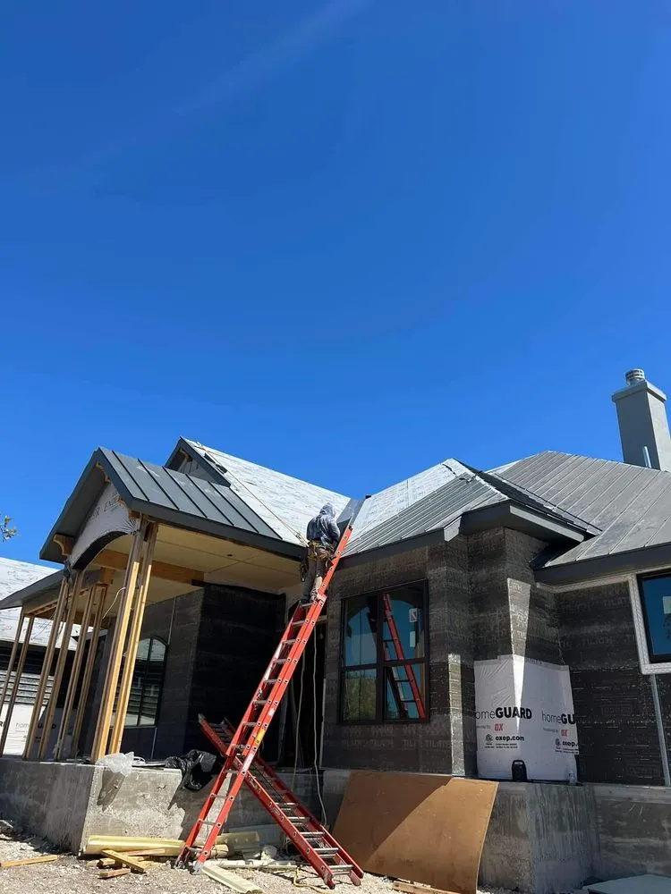 Slide of Sagan Commercial Roofing