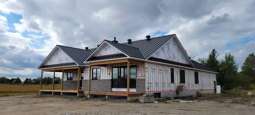 Slide of Sagan Commercial Roofing