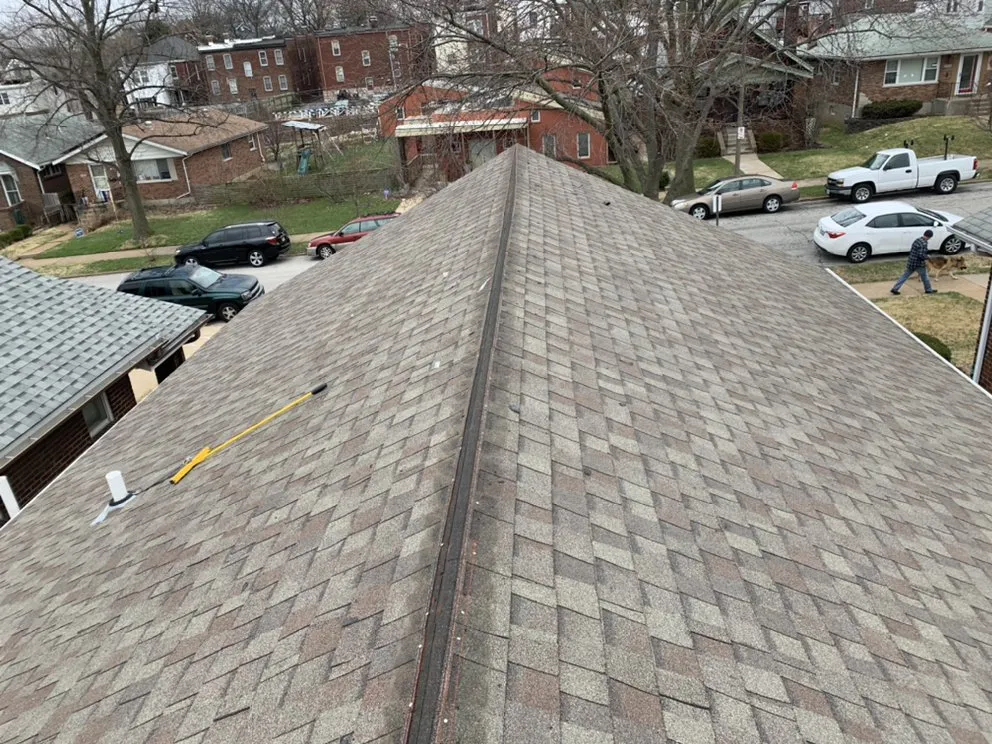 Slide of Saint Louis Roof Management