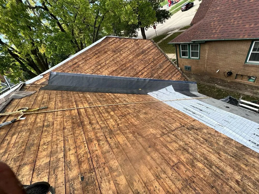 Slide of Saints Roofing