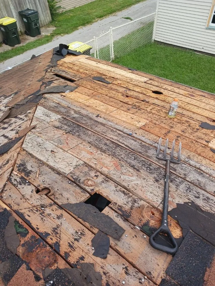 Slide of Salas' Roofing Contractors