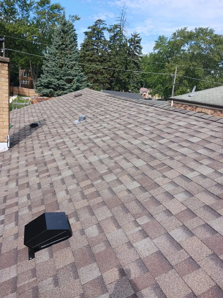 Slide of Salas' Roofing Contractors