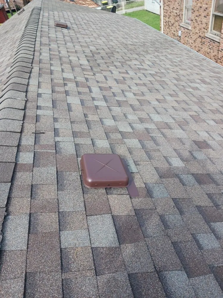 Slide of Salas' Roofing Contractors