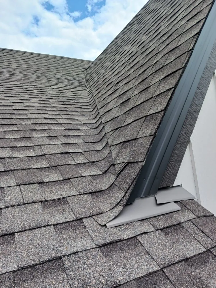 Slide of Salas' Roofing Contractors