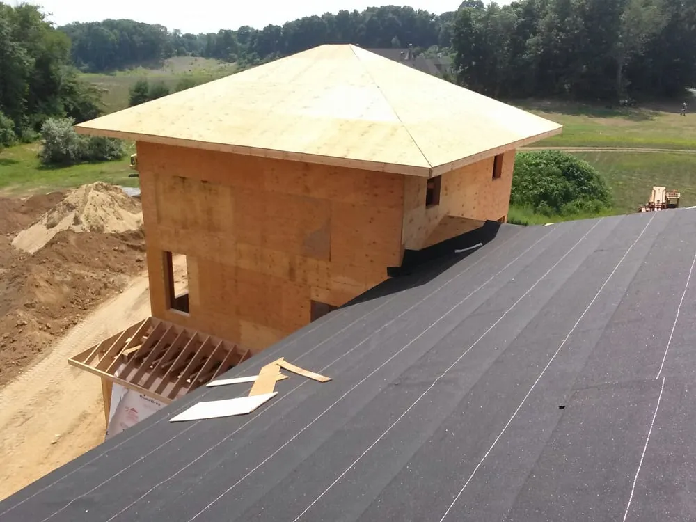 Slide of Salina's Roofing