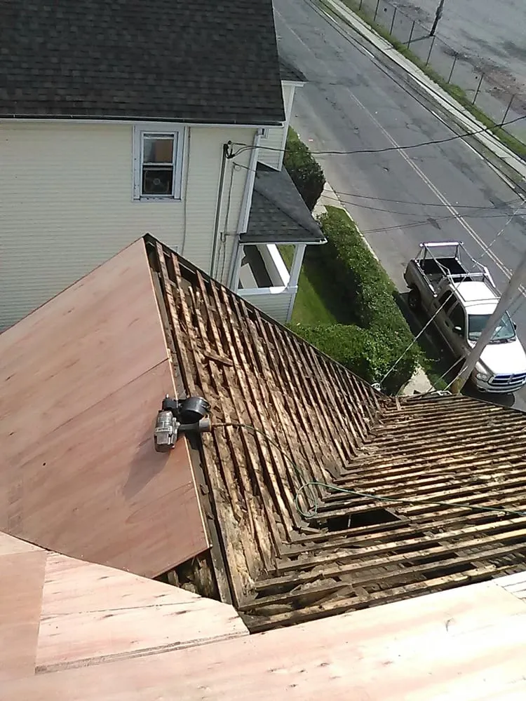 Slide of Salina's Roofing