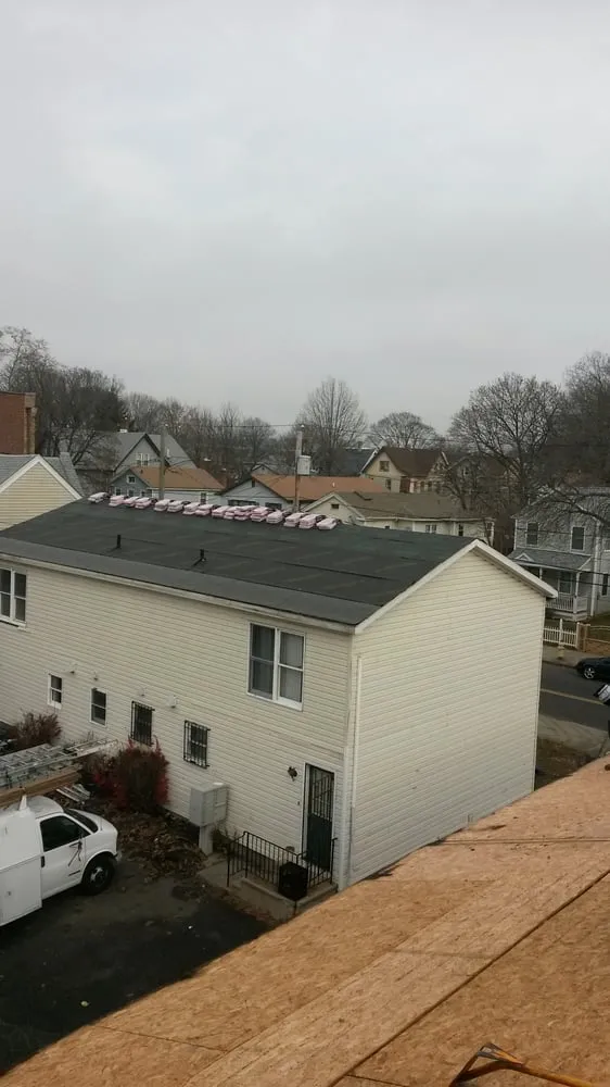 Slide of Salina's Roofing