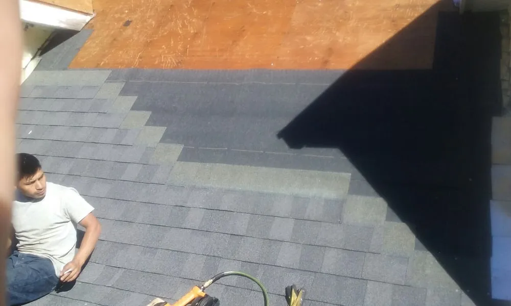 Slide of Salina's Roofing