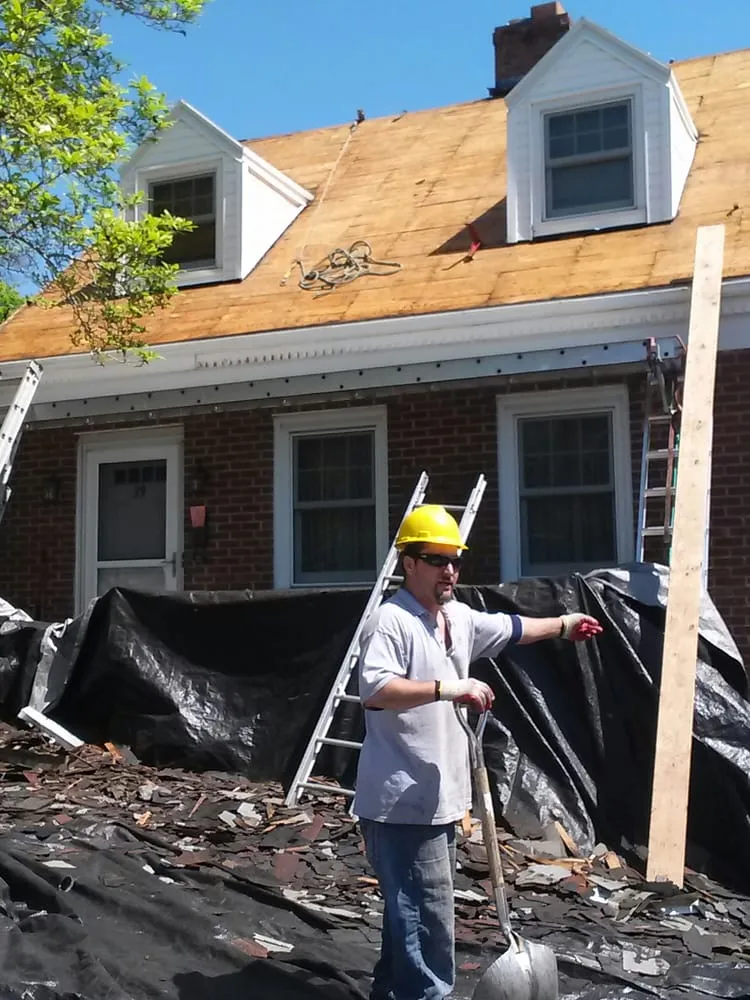 Slide of Salina's Roofing