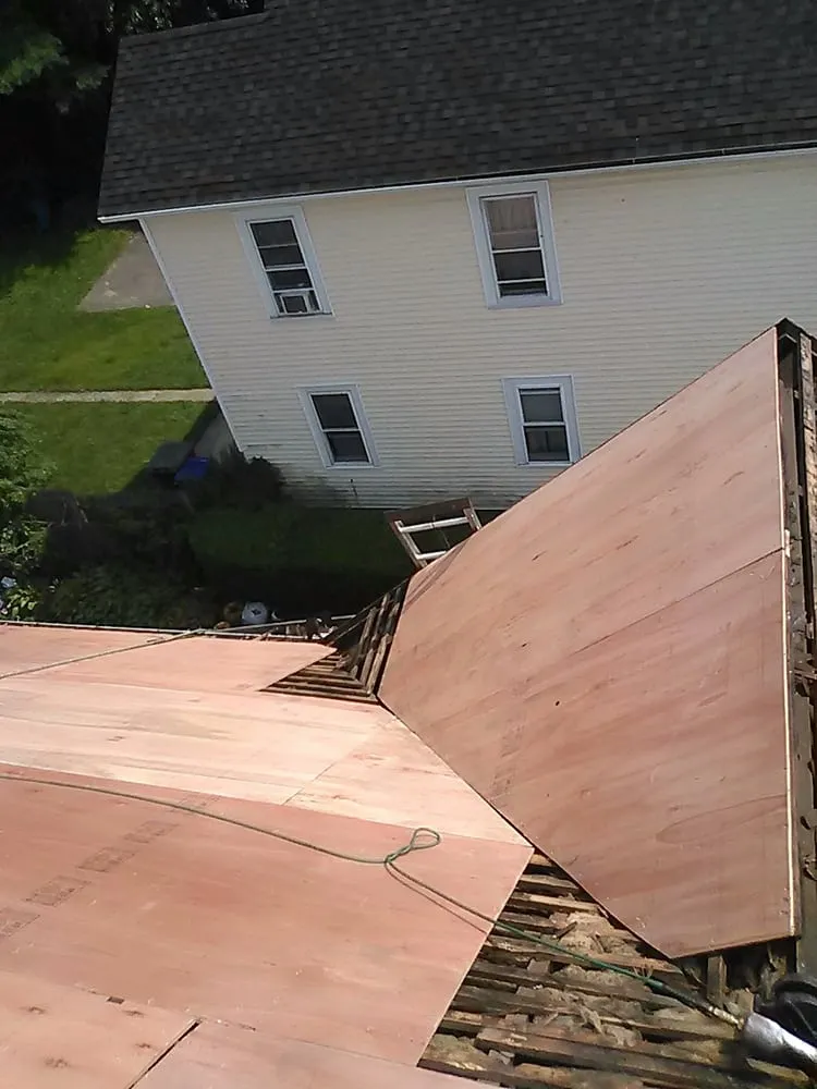 Slide of Salina's Roofing