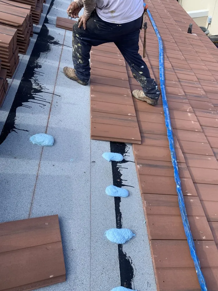 Slide of Sals Roofing Repairs