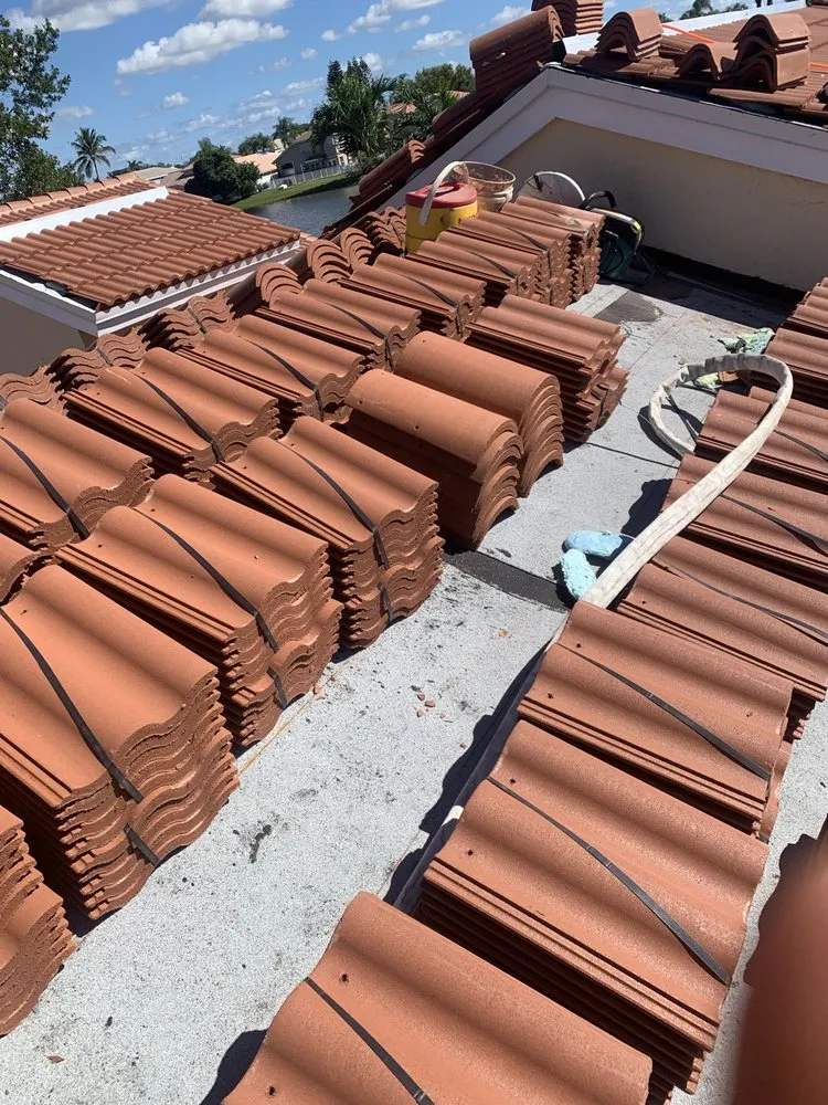 Slide of Sals Roofing Repairs