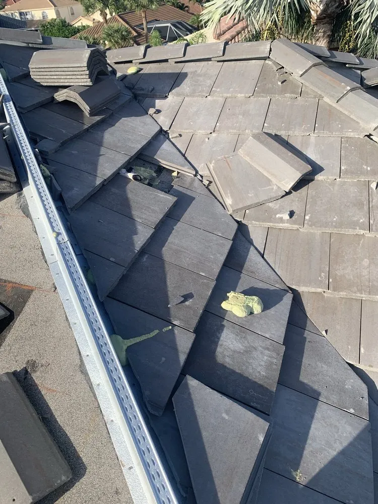 Slide of Sals Roofing Repairs