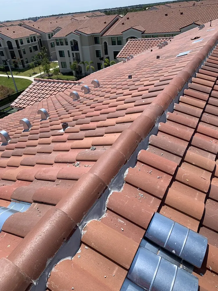 Slide of Sals Roofing Repairs