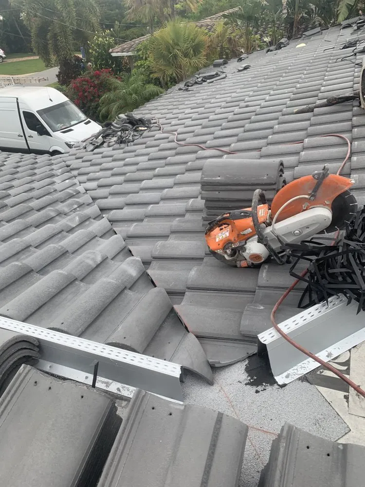 Slide of Sals Roofing Repairs