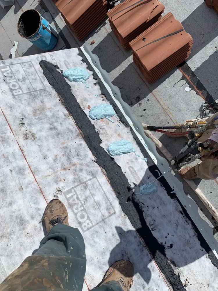 Slide of Sals Roofing Repairs