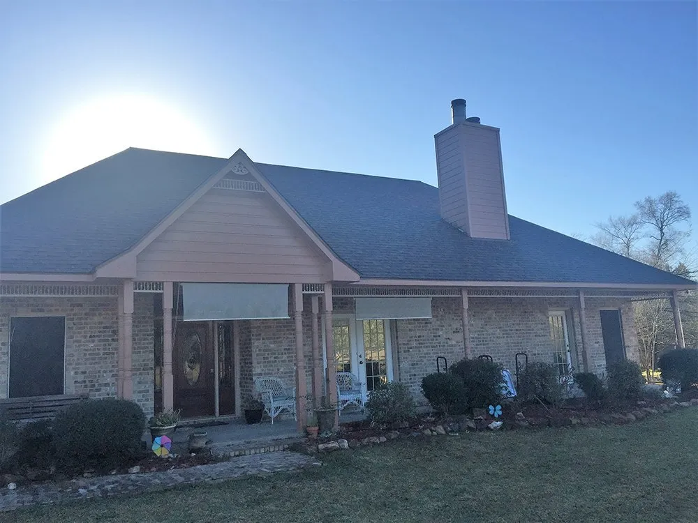 Slide of Sam and Son Roofing