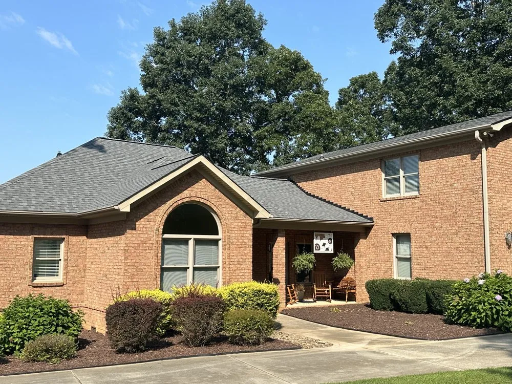 Slide of Sammy Waugh roofing