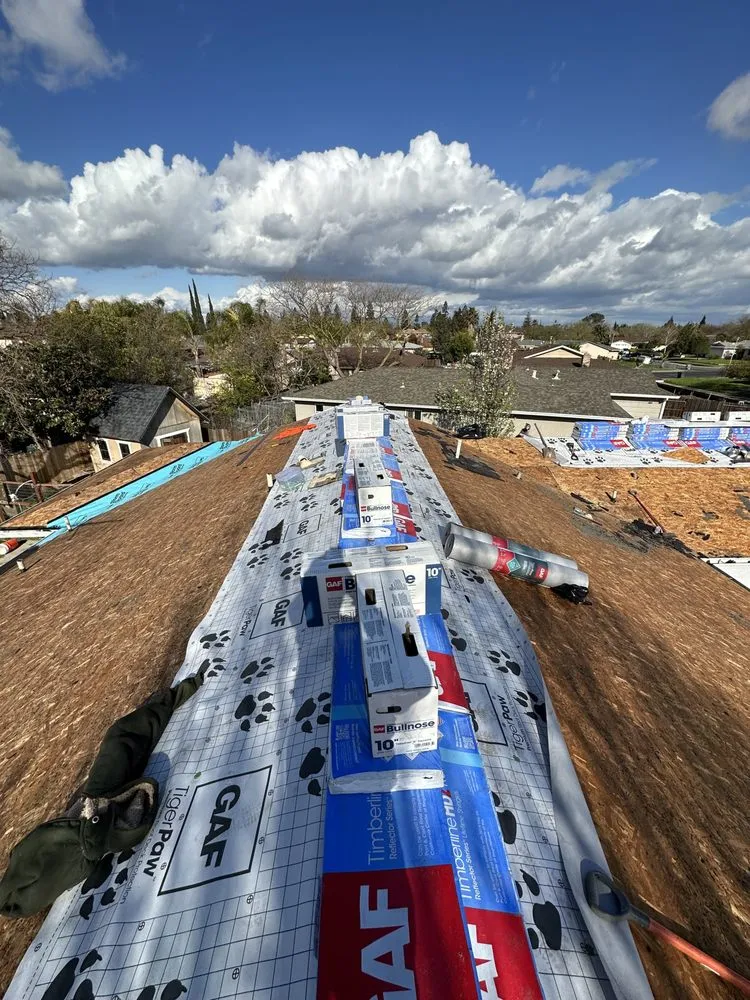 Slide of Samperios Roofing
