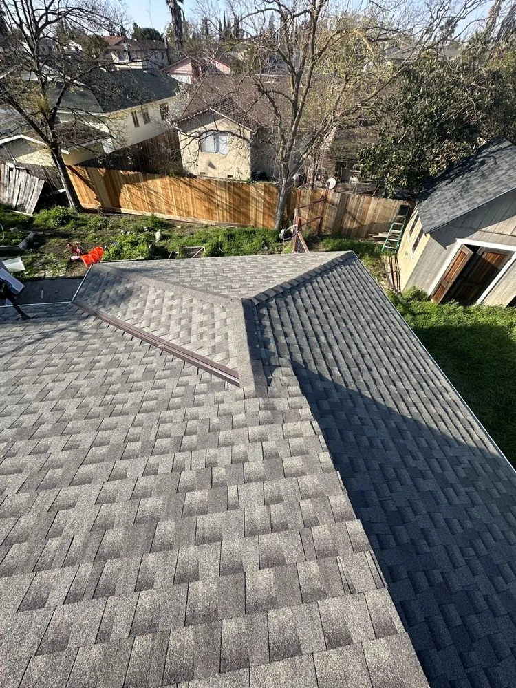 Slide of Samperios Roofing