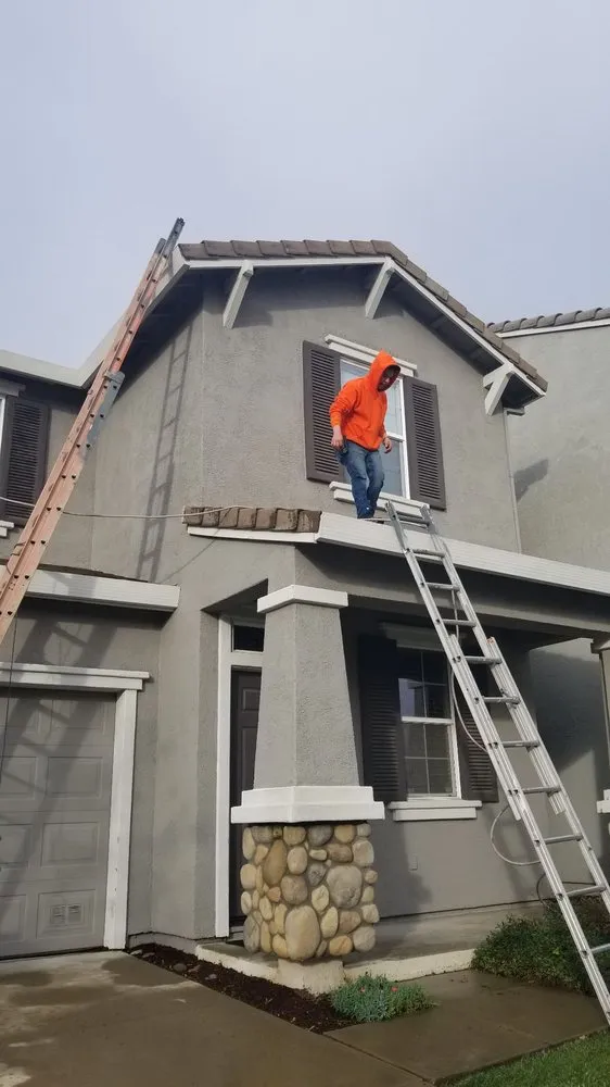 Slide of Samperios Roofing