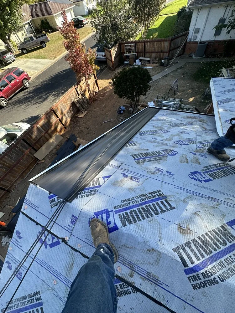 Slide of Samperios Roofing