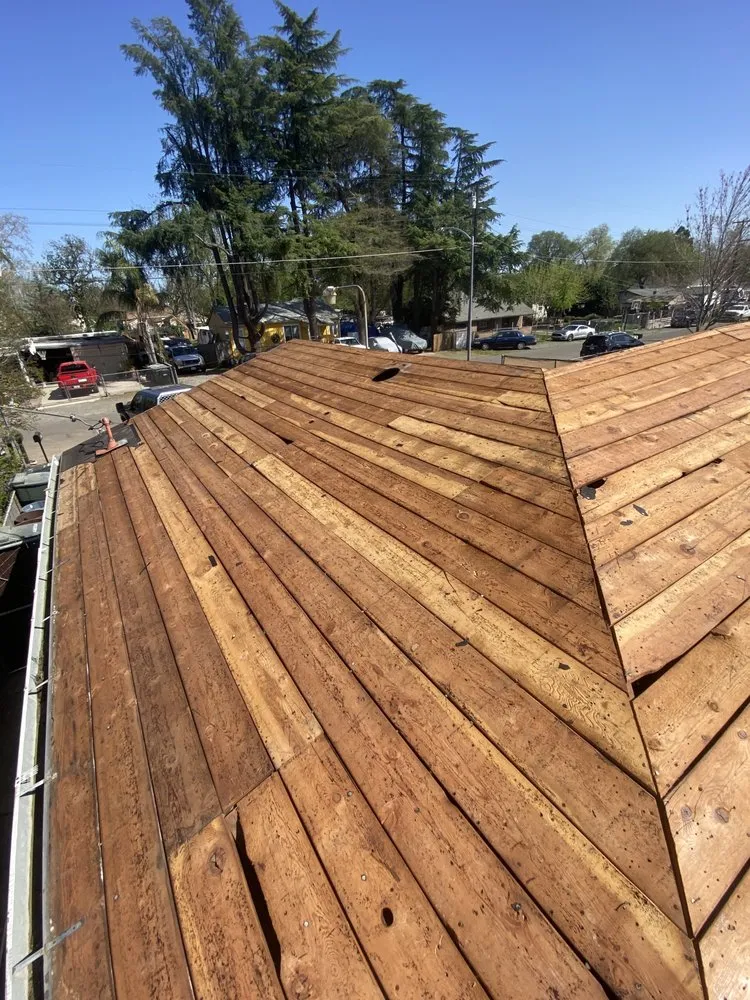 Slide of Samperios Roofing