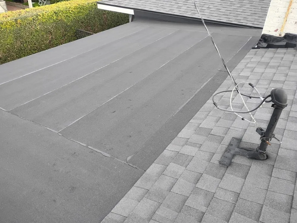 Slide of Sam's Roofing Co