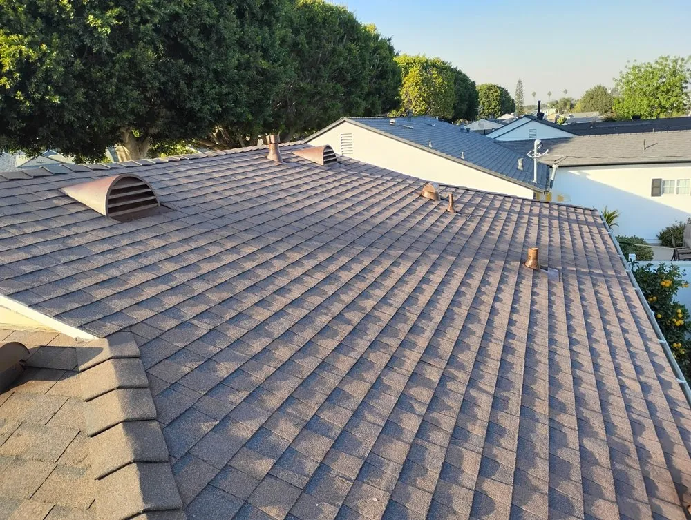 Slide of Sam's Roofing Co