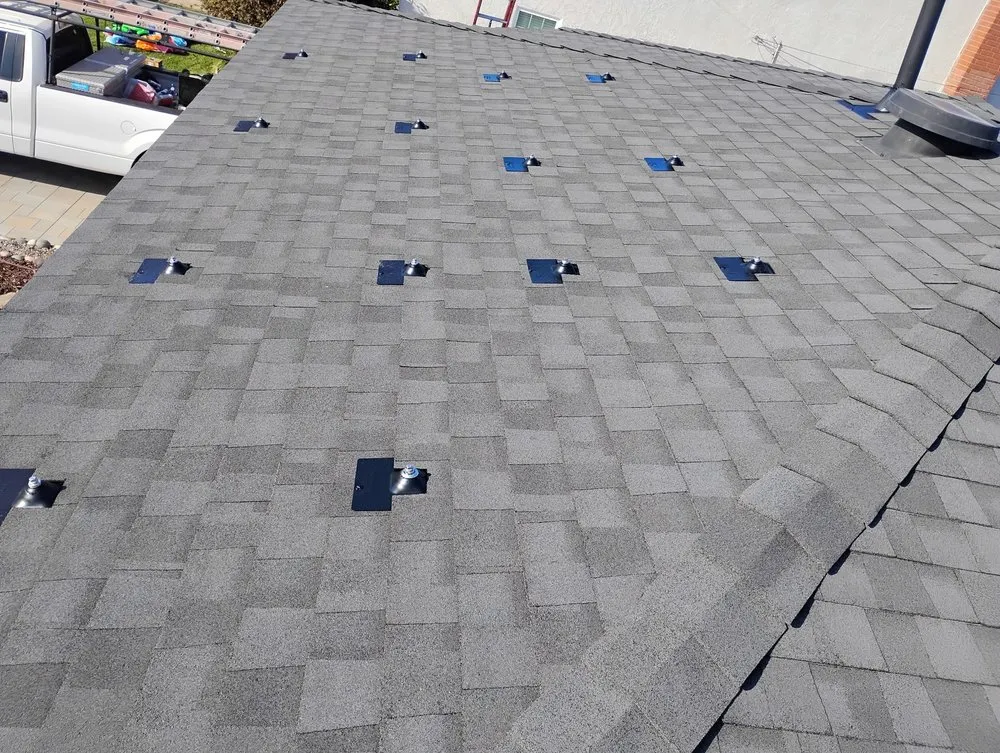 Slide of Sam's Roofing Co