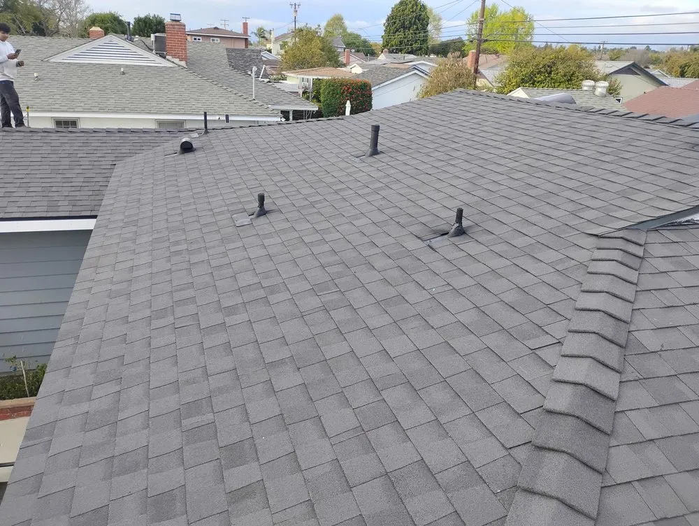 Slide of Sam's Roofing Co