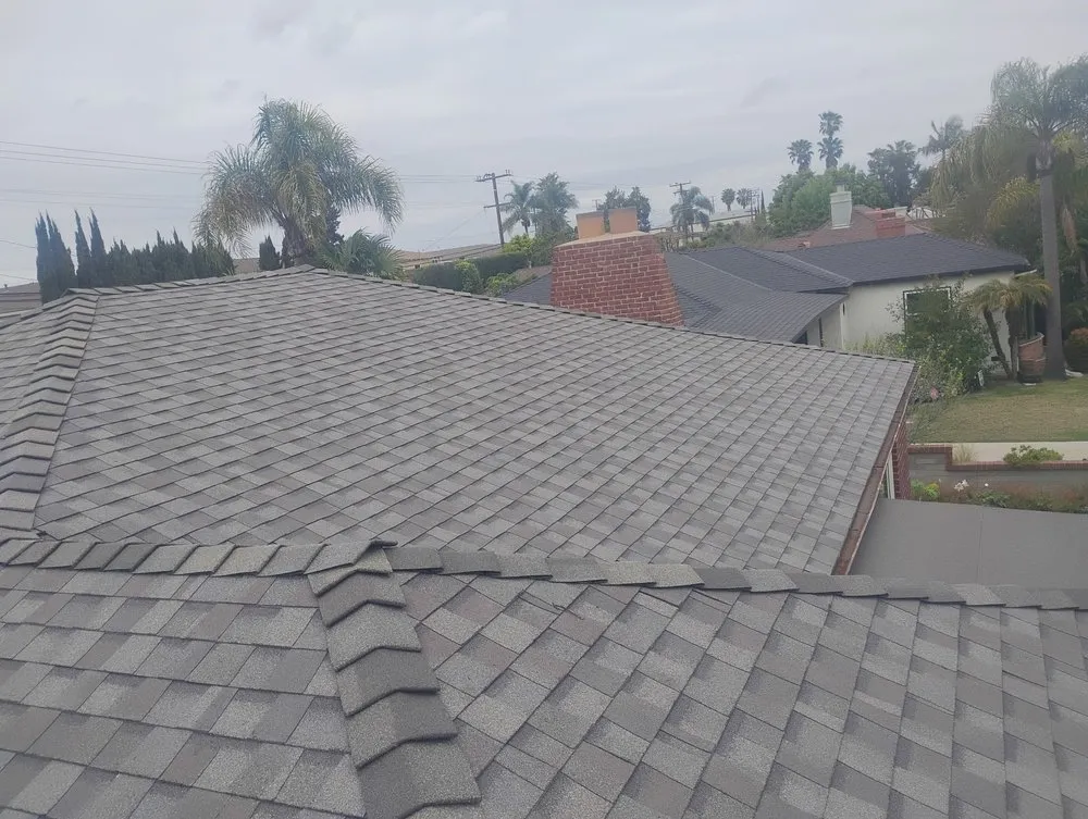 Slide of Sam's Roofing Co